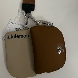 LULULEMON ATHLETICA dual pouch wristlet - trench/burnt caramel/black